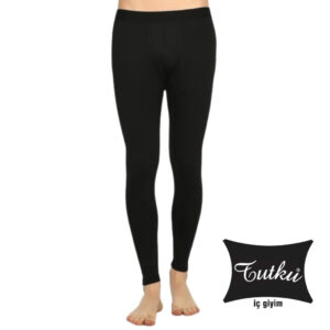 Black full-length leggings on a standing model, with feet visible; brand logo 'Tutku iç giyim' at the bottom right.