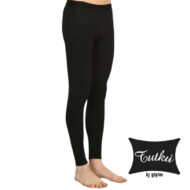 Black full-length leggings worn by a person standing barefoot, with a Tutku İç Giyim logo in the corner.