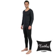 Man modeling a black long-sleeve thermal top and black leggings, standing barefoot with a slight smile. Brand logo Toutku iç giyim shown in the corner.