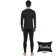 Back view of a man in a black long-sleeve top and black leggings, standing barefoot against a white background (product photo for men's underwear).