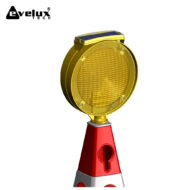 Solar-powered yellow circular warning beacon mounted on a red-and-white traffic cone, Evelux Tech logo visible in the corner.