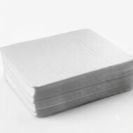 Stack of white facial tissues on a white background, neatly layered